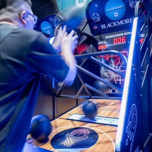 Blackmores branded basketball arcade machines positioned side by side at expo