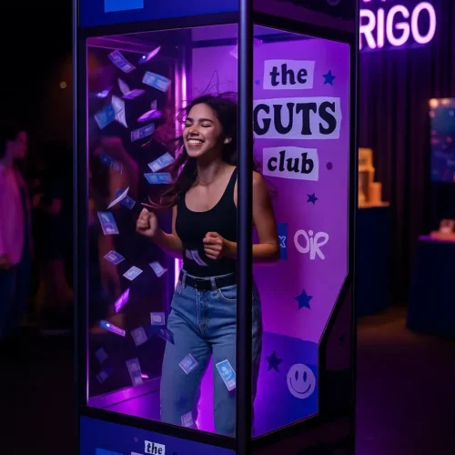 Guest inside a cash grab machine during an AMEX promotional event
