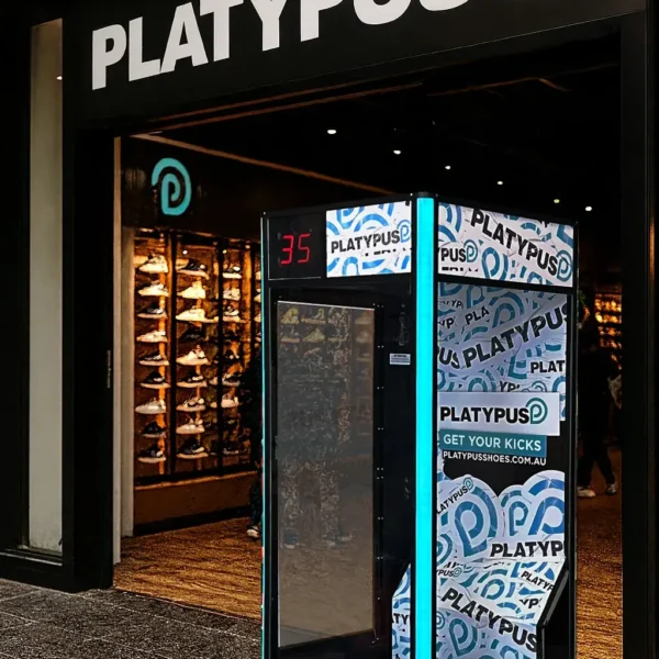 Cash grab machine set up outside a Platypus Shoes retail store
