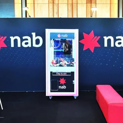 NAB branded claw machine set up for a corporate brand activation