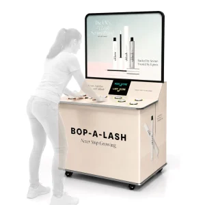 Whack A Light hire machine with custom UKLash branding and player using reaction buttons